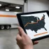 Tablet showing less than truckload shipping tracking route to Buffalo NY for WNY Trucking.
